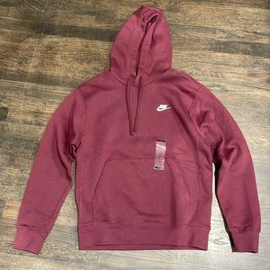 Brand new with tags Nike pullover hoodie in burgundy. Multiple sizes available.